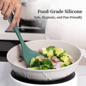 High-quality green heat-resistant silicone spatula for non-stick pans in a kitchen