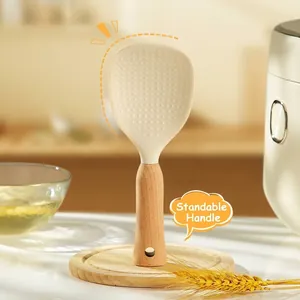Non-stick silicone rice paddle with standing wooden handle for kitchen use