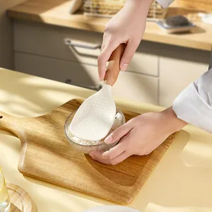 Non-stick food-grade silicone rice spoon with a stylish wooden handle for household kitchen