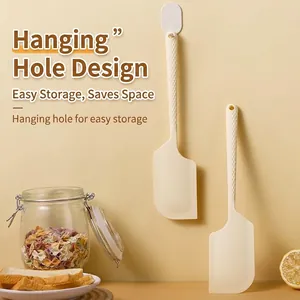 Food-grade cream-colored silicone spatula for professional baking and cooking tasks