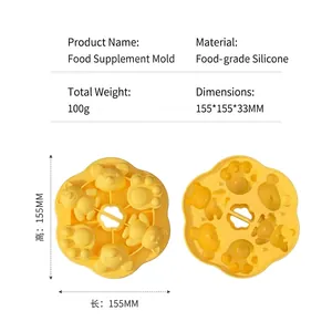 Yellow food-grade silicone baby food mold with cat paw and bear shapes