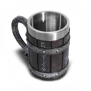 Close-up detail of a wooden barrel beer mug with stainless steel liner and Nordic runes.