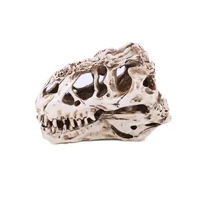 Vista detallada del adorno de calavera de T-Rex en resina con textura de hueso real