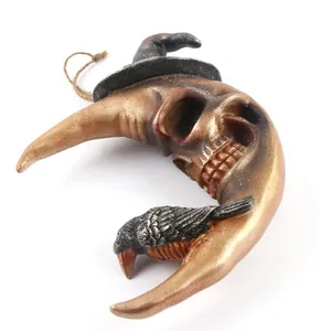 Spooky Halloween crescent moon skull resin ornament with black witch hat and raven