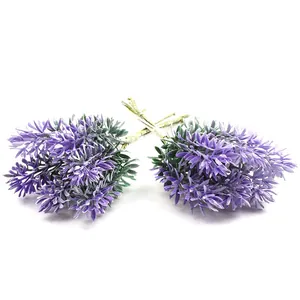 Detail shot of artificial lavender bouquet with 6 realistic purple floral stems.