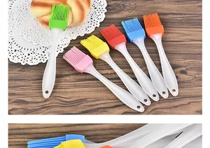 Detailed view of six colorful heat-resistant silicone basting brushes for baking.