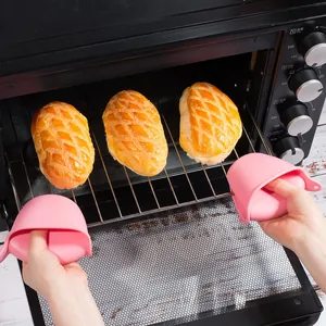 Heat-resistant pink silicone oven pinch mitts for safe baking and kitchen cooking tasks
