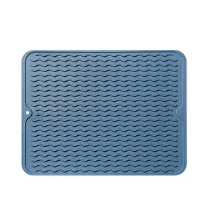 Mantel de silicona azul resistente al calor con textura ondulada para mesa y cocina