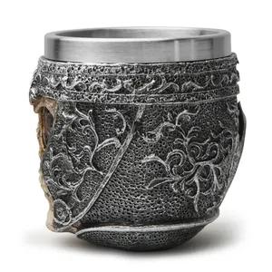 Detailed side view of a gothic skull resin mug with stainless steel liner for bars.