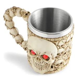 Macro view of detailed 3D skull resin mug with stainless steel lining and red eyes