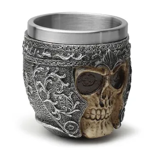 Detailed side view of gothic skull mug with stainless steel liner and resin exterior.