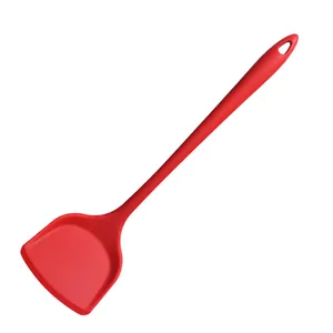 Heat-resistant red silicone spatula kitchen tool for non-stick cookware essentials.