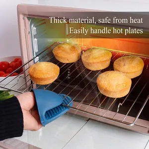 Heat resistant blue silicone oven mitts for safely picking up hot baking racks