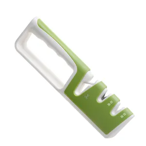 Green manual knife and scissor sharpener with ergonomic handle for kitchen knives