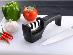 Professional 3-slot manual knife sharpener shown in a kitchen setting on a board.