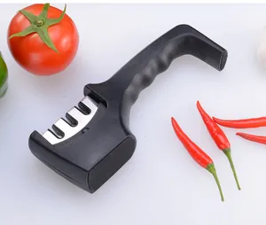 Detail view of ergonomic 3-stage manual knife sharpener with non-slip base design