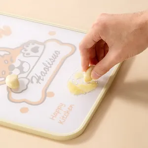 Premium double-sided cutting board with built-in garlic grater and cute dog pattern design