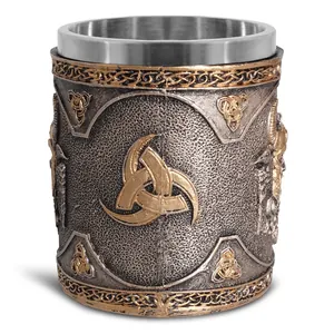 Detail of Norse Viking beer mug with resin carvings and stainless steel inner liner.