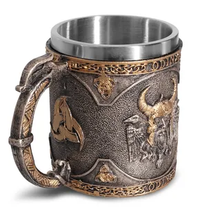 Detailed view of Viking beer mug featuring Odin carvings and stainless steel liner.