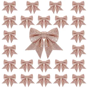 Set mit roségoldenen Glitzer-Weihnachtsschleifen für Festbaumschmuck und Geschenkverpackung.