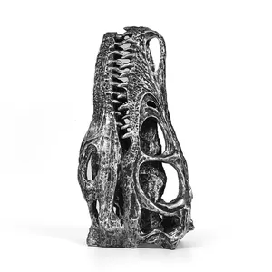 Detailed macro view of a resin velociraptor dinosaur skull ornament with weathered finish