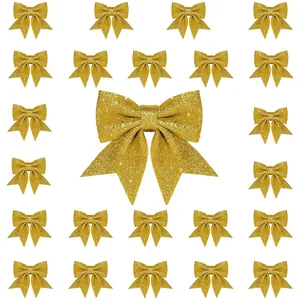 Set aus glänzenden goldenen Weihnachtsschleifen für Baumschmuck und Geschenkverpackungen