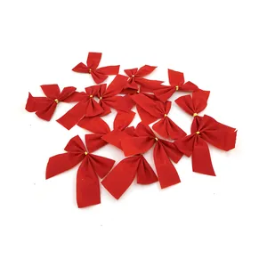 Group of 12 red velvet Christmas bows with gold ties for tree decor