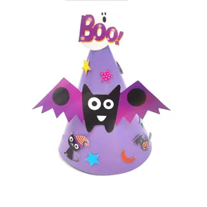 Close-up detail of Halloween DIY purple paper party hat with cute bat and ghost decorations