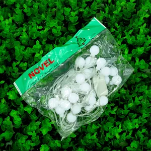 Detailed view of frosted ball LED Christmas string lights stored in clear plastic packaging