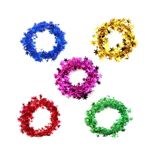 Five colors of Christmas star tinsel garland shown in a circular arrangement on white.