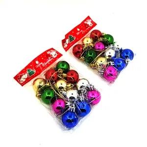 Detailed view of colorful Christmas bauble ornament sets in retail display packaging.