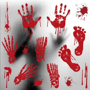 Detailed view of Halloween bloody handprint and skeleton footprint window clings.