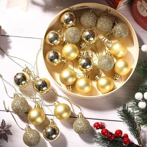 24-piece set of 3cm golden Christmas baubles in matte, shiny, and glitter finishes.