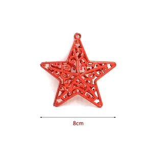 Detail view of 8cm red hollow star Christmas tree ornament decoration.