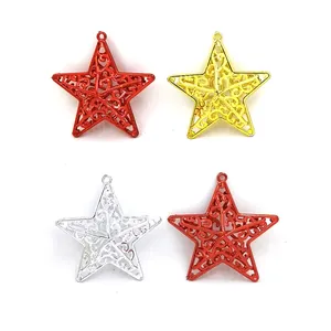 Detailed view of hollow-out five-pointed star ornaments for Christmas tree decoration
