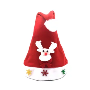 Detailed view of festive Christmas hat with cute white reindeer and snowflake motifs
