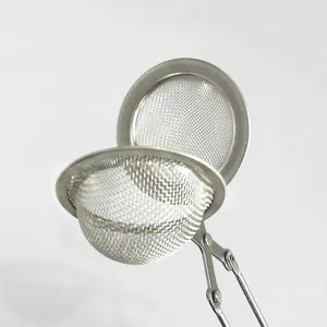 Stainless steel tea infuser mesh tea ball strainer with handle for loose leaf tea brewing.