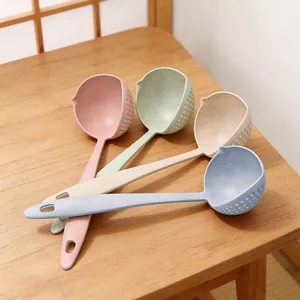 Closeup details of wheat straw soup colander spoons, long handle 2-in-1 filtering spoon.