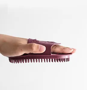 Silicone meridian massage brush detail view showing comfortable grip and flexible bristle design.