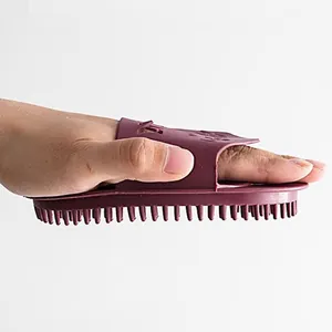 Silicone body massage brush for cellulite reduction and meridian relaxation, handheld design.