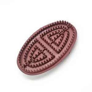 Brown oval meridian massage brush for body shaping and relaxation, top view display.