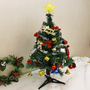 Detailed macro view of 50cm desktop Christmas tree with various festive ornaments and star