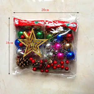 Close-up view of the 20x18cm Christmas ornament set with baubles and star tree topper