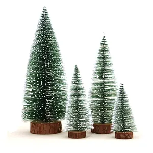 Set of four mini frosted cedar Christmas trees with natural wooden bases for holiday decor