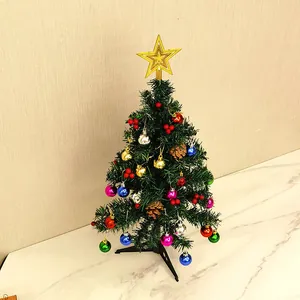 Complete mini desktop Christmas tree set with colorful ornaments and gold star topper