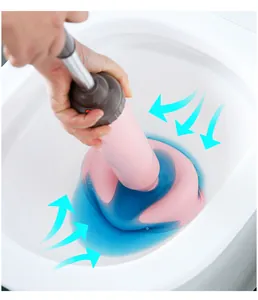 Close-up detail of the pneumatic toilet plunger in action, showing strong suction power.