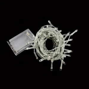 Close-up detail of LED Christmas fairy string lights with a transparent battery case