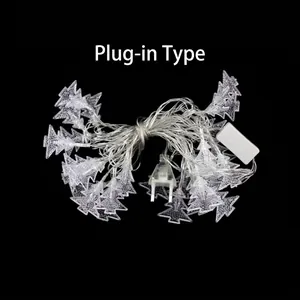 Clear Christmas tree-shaped LED fairy string lights with a standard plug-in power source