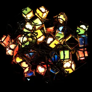 Detail of multi-color Christmas LED string lights with heart-shaped cube covers