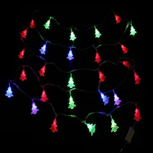Colorful LED Christmas tree string lights glowing bright in dark festive background.